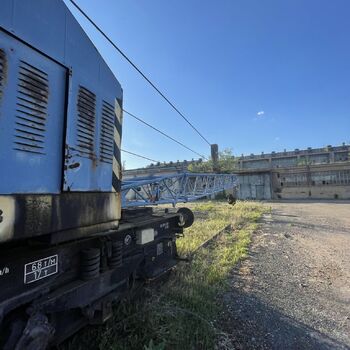 an abandoned boat repair shop with a police boat