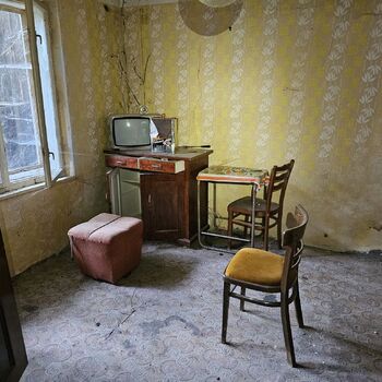 Dům v ovocné zahradě.