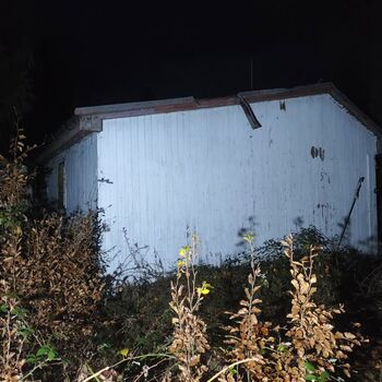 The campers won't be coming back here... An abandoned camp at night...