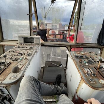 an abandoned boat repair shop with a police boat