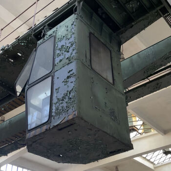 an abandoned boat repair shop with a police boat