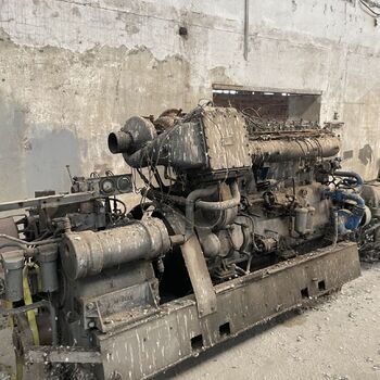 an abandoned boat repair shop with a police boat
