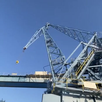 an abandoned boat repair shop with a police boat