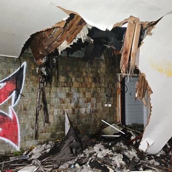 What put an end to this motor lodge? An abandoned motor lodge...