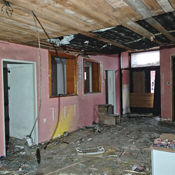 What put an end to this motor lodge? An abandoned motor lodge...