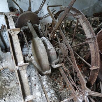 Abandoned farmhouses side by side.