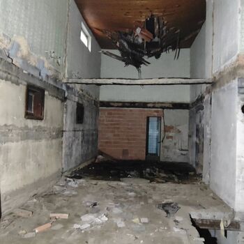 What put an end to this motor lodge? An abandoned motor lodge...