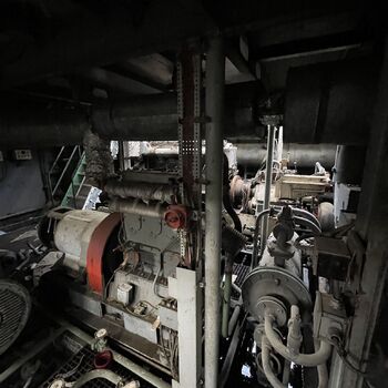 an abandoned boat repair shop with a police boat