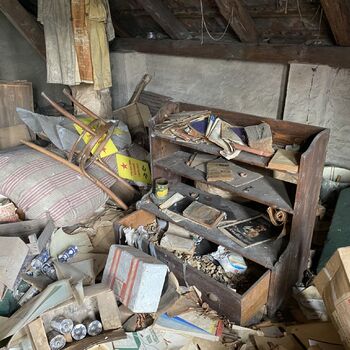 Abandoned farmhouses side by side.