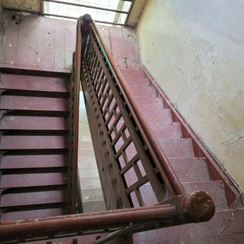 An abandoned apartment building in the village.