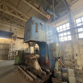 an abandoned boat repair shop with a police boat