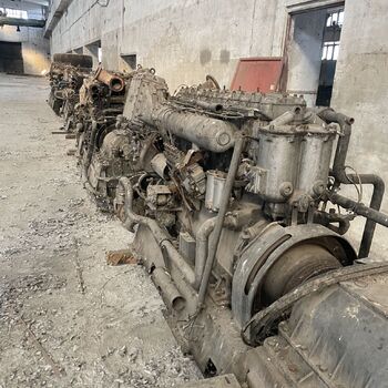 an abandoned boat repair shop with a police boat