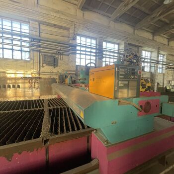 an abandoned boat repair shop with a police boat