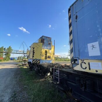 an abandoned boat repair shop with a police boat