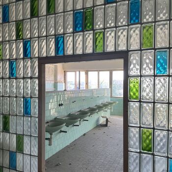 an abandoned boat repair shop with a police boat