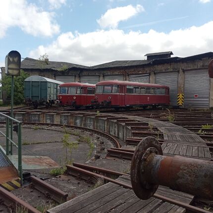 The depot with a collapsed roof and a slowly crumbling station building.2024 The depot with a collapsed roof and a slowly crumbling station building.2024