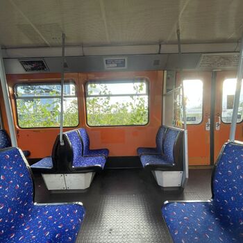 an abandoned boat repair shop with a police boat
